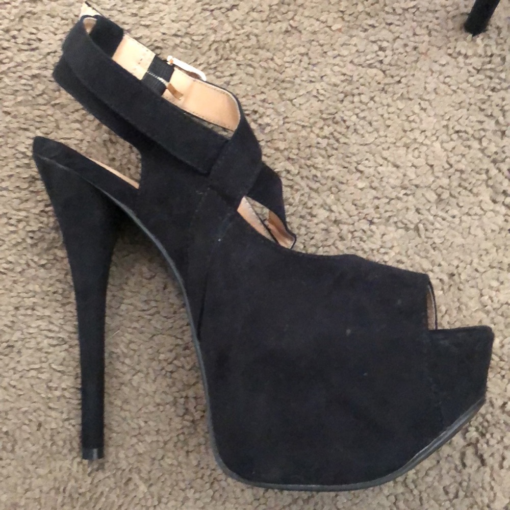 Black open toe stilettos.